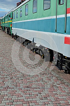 The wheels of a modern Russian electric train with shock absorbers and braking devices. The side of the ca