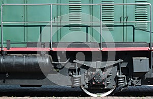 The wheels of a modern Russian electric train with shock absorbers and braking devices. The side of the ca