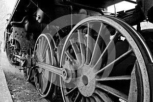 Wheels of an old steam locomotive photo