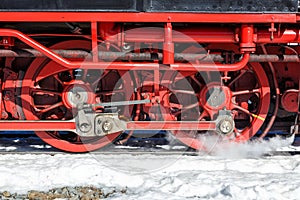 Wheels and rods on a steam train locomotive of Brockenbahn railway on Brocken mountain in Germany