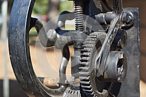 Wheels and sprockets of vintage drill photo