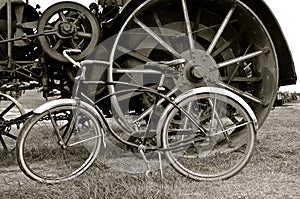 Wheels of a steam engine an vintage bicycle