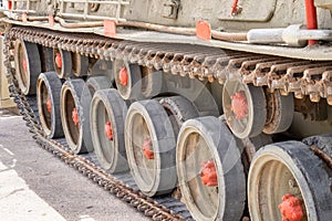 Wheels and tank tracks of undefined tank photo