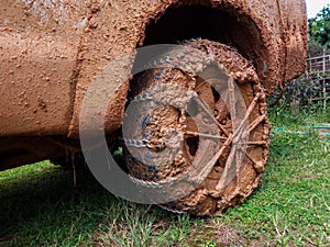 Wheels tires and off road truck shaft that goes in the and mud through the wheels in forest