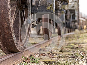 Wheels on a vintage train wagon. old red vintage train wagon