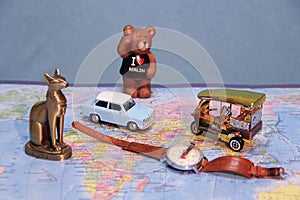 Where are we going on vacation? The symbols of the countrys on the map. Old Blue car, Thai keb, a bear from Berlin. I love Berlin.