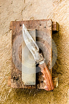 Whetstone and knife.