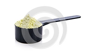 Whey protein in scoop on a white background.