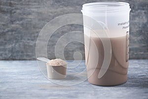 Whey protein shaker and scoop. Sport nutrition.