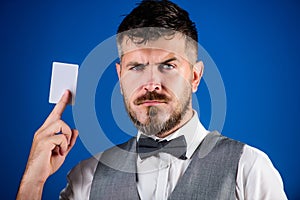 Which bank credit card easy to get. Man bearded hipster hold plastic blank card blue background. Take this card. Make