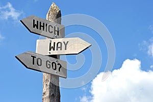 Which way to go? Crossroads sign with three arrows