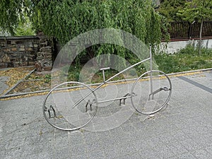 A whimsical bike rack that cleverly mimics the form of a bicycle