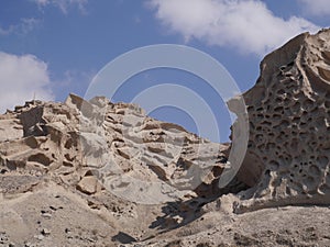 Whimsical relief, formed by weathering and erosion. Santorini, Greece.