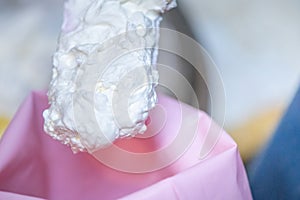 whipped cream cooking process.woman mixing Fresh cream for making whipped cream or desserts and bekery.woman making whipped cream