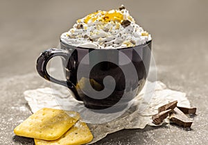 Whipped cream dessert with apricot jam cookies and chocolate
