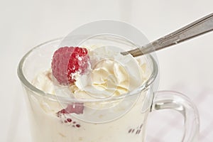 Whipped cream with fresh berry. Close up