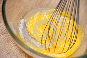 Whipping yolk eggs and sugar together