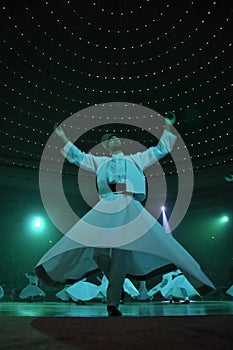Whirligig dervish in religious dancing