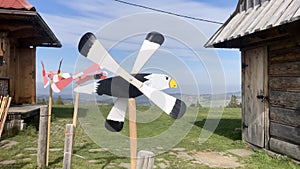 Whirligig eagles - wooden bird in Zakopane. Poland.