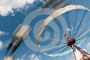 Whirling carousel on the sky photo