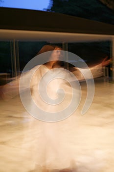 Whirling dancing girl blur