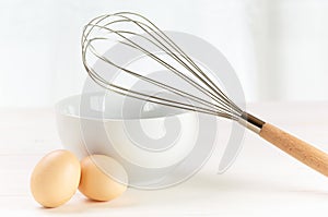 Whisk and eggs