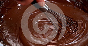 Whisk Turning Milk Chocolate