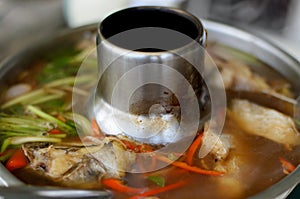 Whisker sheat fish in spicy and sour soup photo