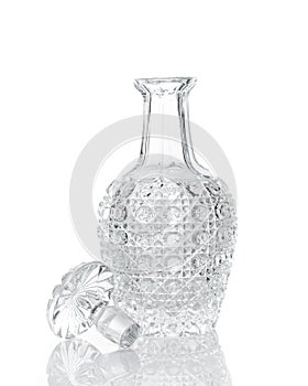 Whiskey crystal decanter on white photo