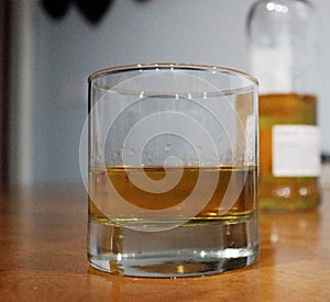 Whiskey Glass Closeup sitting on Table