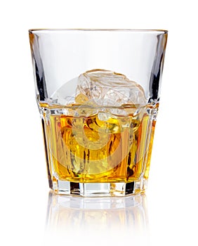 Whiskey glass with ice cubes