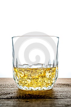Whiskey glass with ice cubes