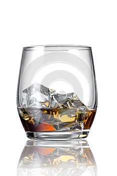 Whiskey with ice cubes, isolated on the white background.