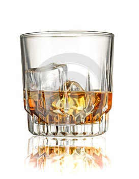 Whiskey with ice cubes, isolated on the white background.