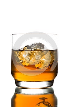 whiskey with ice on white background