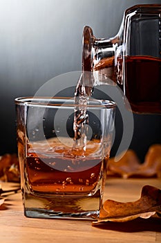 Whiskey on a old wooden table.