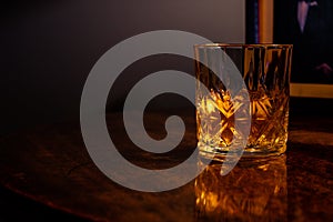 Whiskey on the rocks in a crystal tumbler