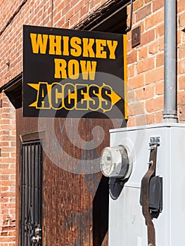 Whiskey Row access sign