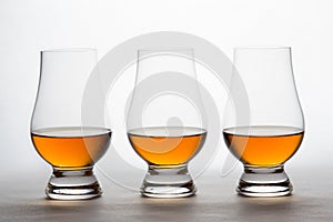 Whiskey in Three Crystal Tasting Glasses