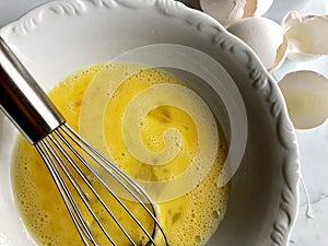 Whisking egg yolks
