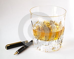 Whisky glass and fountain pen, creativity and lifestyle