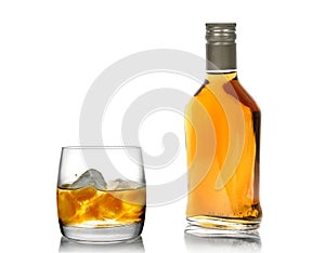 Whisky in a glass (with an ice) and a bottle(2)