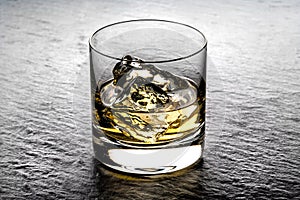 Whisky on the rocks in a glass tumbler
