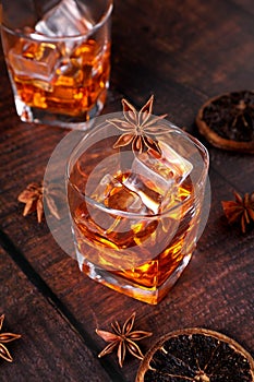 Whisky Rum or Cold Drink with Star Anise and Dried Orange Slices