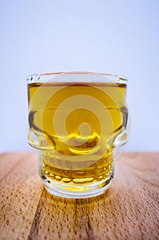 whisky, rum shat in a glass with a canius pattern