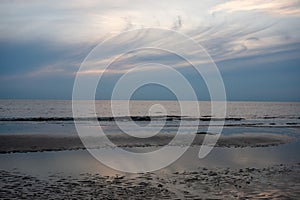 A Whispy Sunset Sky Over the Ocean at the Bay in The Villas, New Jersey