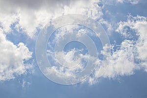 Whispy white clouds in teal blue sky  background or replacement