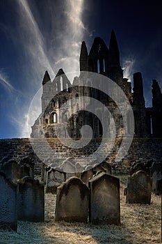 Whitby abbey and cemetery in ghostly light