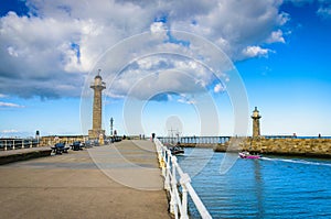 Whitby pier at the harbor entrance at Whitby in North Yorkshire