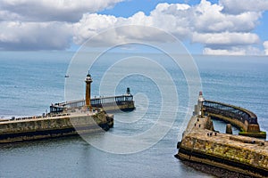 Whitby pier and lighthouse